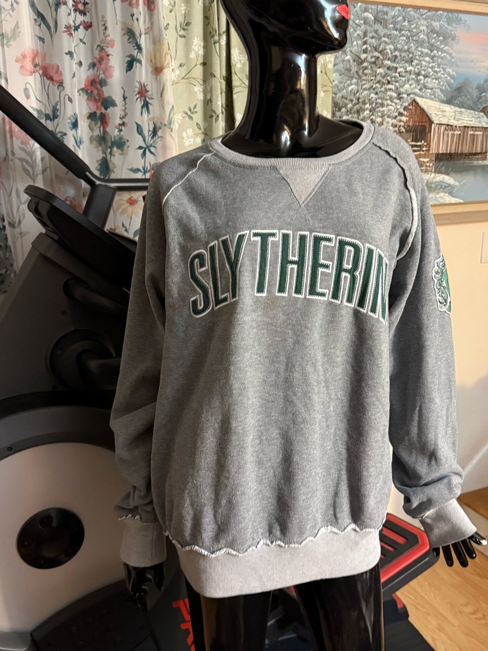 Universal Grey Crewneck Sweatshirt with Green Lettering